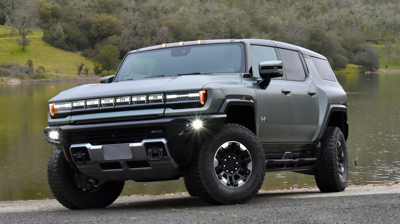 2024 GMC Hummer EV SUV front three quarter view.