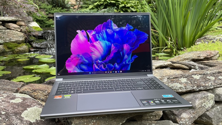 Acer Swift X 16 (SFX16-61G) on rocks near a pond