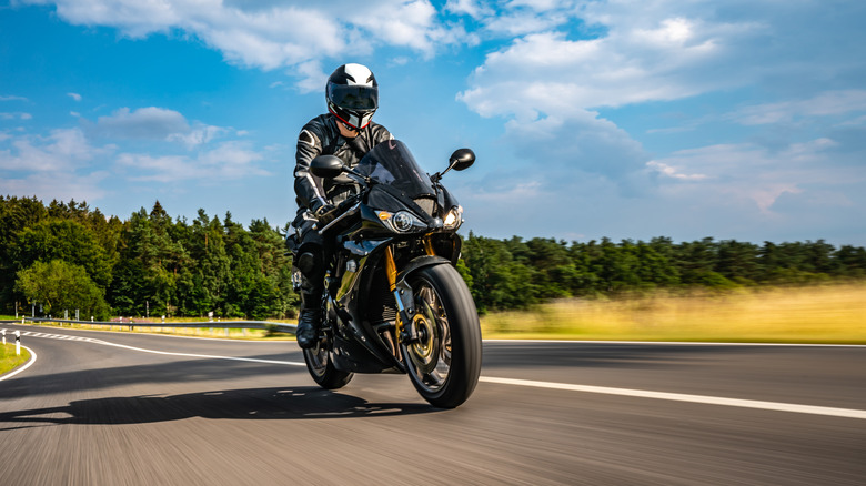 man riding motorcycle