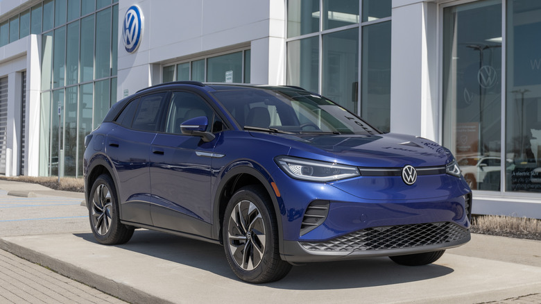 The Volkswagen ID.4 parked outside a Volkswagen dealership.