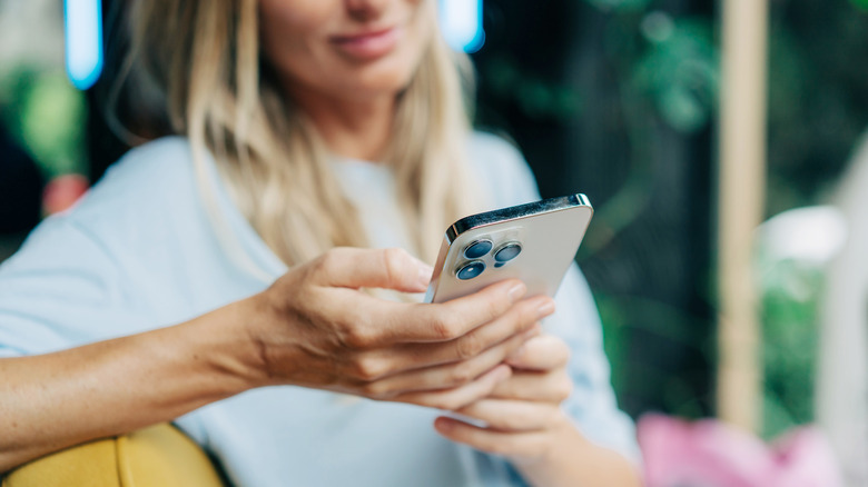 woman using an iphone