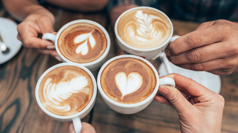 coffee cups featuring latte art